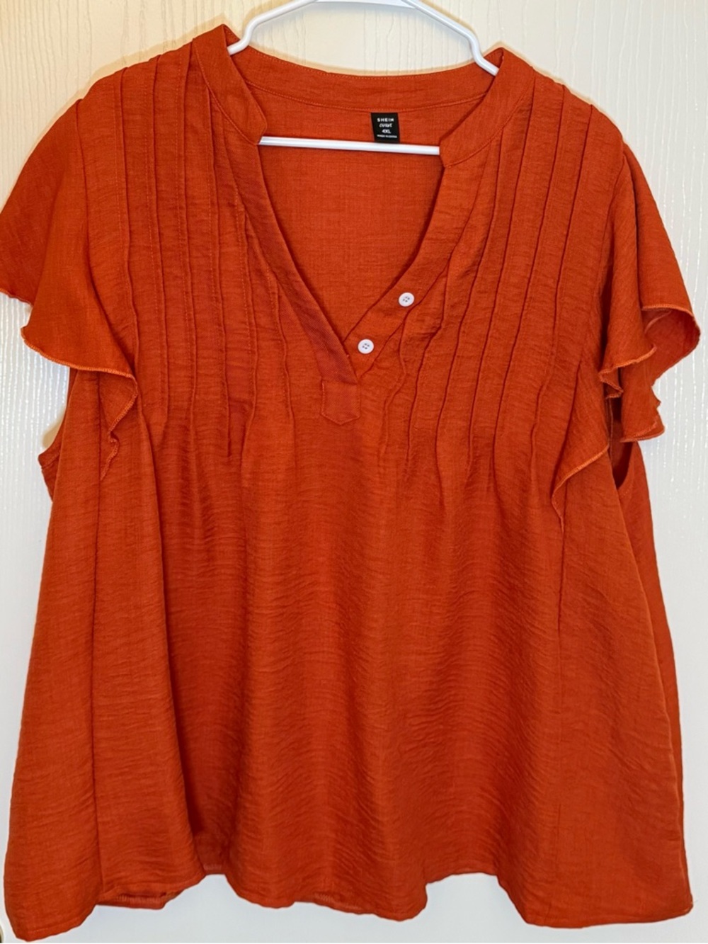 The Shine Curve Blouse in Size 4XL is a stylish and comfortable top